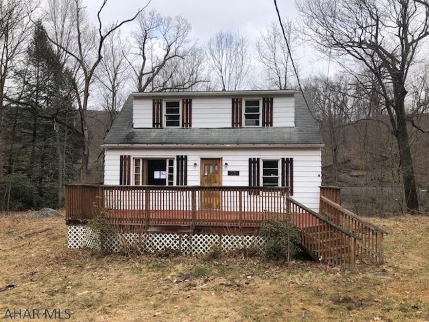 2BR 1BA on large lot in need of a lot of TLC being sold as-is. Furnace and hot water heating has been removed, plumbing partially removed unknown water and sewer.