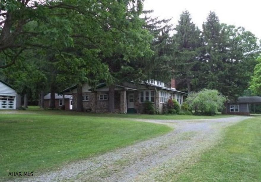 All stone home with outbuildings and lots of history