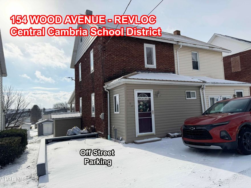 You'll love the extensive renovations and LOW TAXES for this 2 Bedroom, 2 Bath 1/2 double in Revloc/Central Cambria School District! Metal roof & vinyl siding installed in 2019. The first floor has a Living Room, eat-in Kitchen, remodeled full Bath, and main floor laundry! The 2nd floor has a totally redone Bath with walk-in shower & linen closet. Walk-up attic. Rear covered deck. Storage shed and level yard. Lots of newer flooring, drywall, light fixtures, ceiling fans, some windows. Off street parking in front for 1 car. Move right into this nice home!