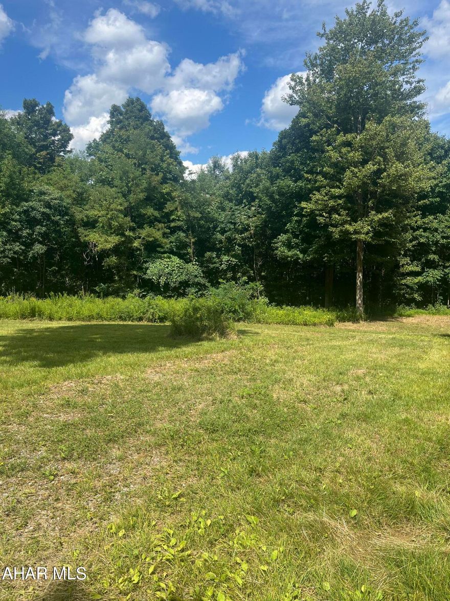 Beautiful and secluded land containing 2 parcels. Great for hunting or camping. Build your new dream home too with a beautiful view and lots of surrounding woods.