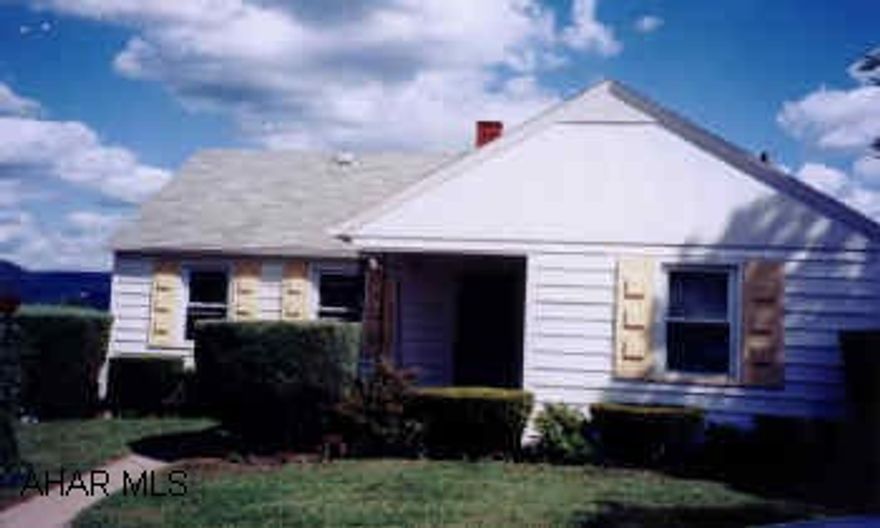 Nice vinyl sided bungalow with covered rear porch and great view Clean and neat 1 1/2 Story, super covered rear porch. Electric air purifier on furnace.