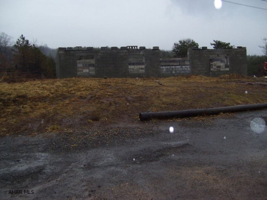 10 acres for sale. Half wooded half open. Can be a place to build your home. Private well, and septic. Electric to property. With out side buildings. Would make a nice farmett or a really good place for hunting. Possibilities unlimited.