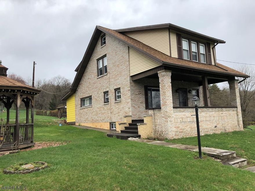 All brick 2 story on 1.85 acres (110x720) with detached garage and carport.  3BR 2BA with original hardwood floors.  Walk up attic.