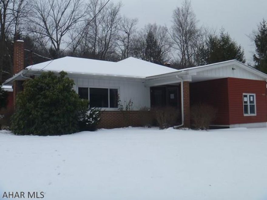 Large ranch home on over an acre with 2 car garage. Open floor plan kitchen dining area with separated living area. Needs some TLC. Property was built prior to 1978 and lead based paint potentially exists.