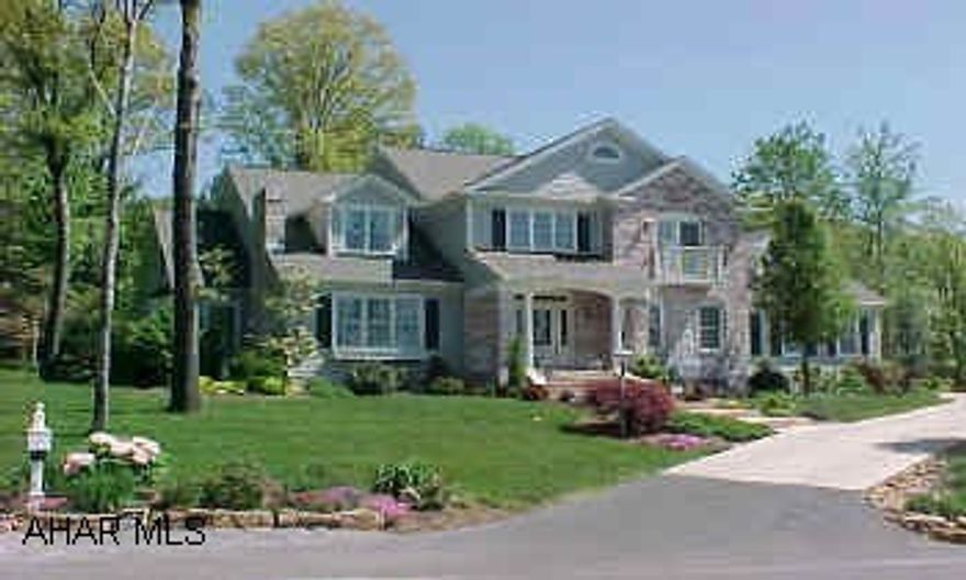 Gorgeous home in prestigous Hunter's Woods. Large first floor master suite, lovely formal living room w/marble fireplace,formal dining w/custom painting,terrific eat-in kitchen w/granite ctops, large island opening to family room w/ brick fireplace. French doors lead to a covered patio and beautifully landscaped yard.Hardwood floors, split stairway,first floor guest room, den and laundry room. Great finished basement w/kitchenette, bath and bath. Exterior is brick and Hardyboard..4 zoned heat w/modular manifold plumbing system. List of upgrades available..Spacious and bright-open and flowing floor plan.  Call Dianne Stultz for your showing. cell-  329-1856.