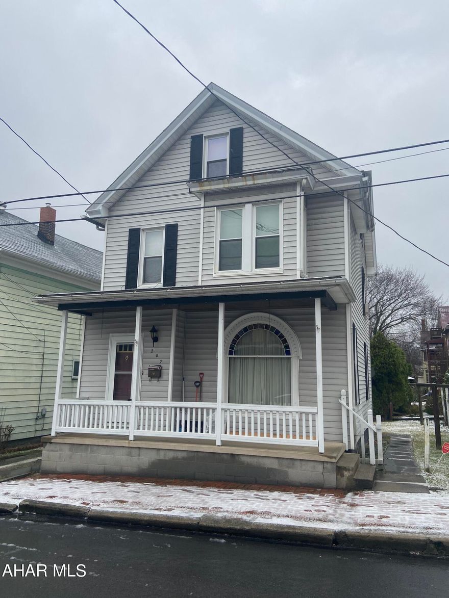 Very nice 3 bedroom with 2 extra rooms. Enjoy the front porch on summer evenings. When you enter the house you will be welcomed by beautiful hardwood floors. Newer carpet!! Cute home that is well kept.