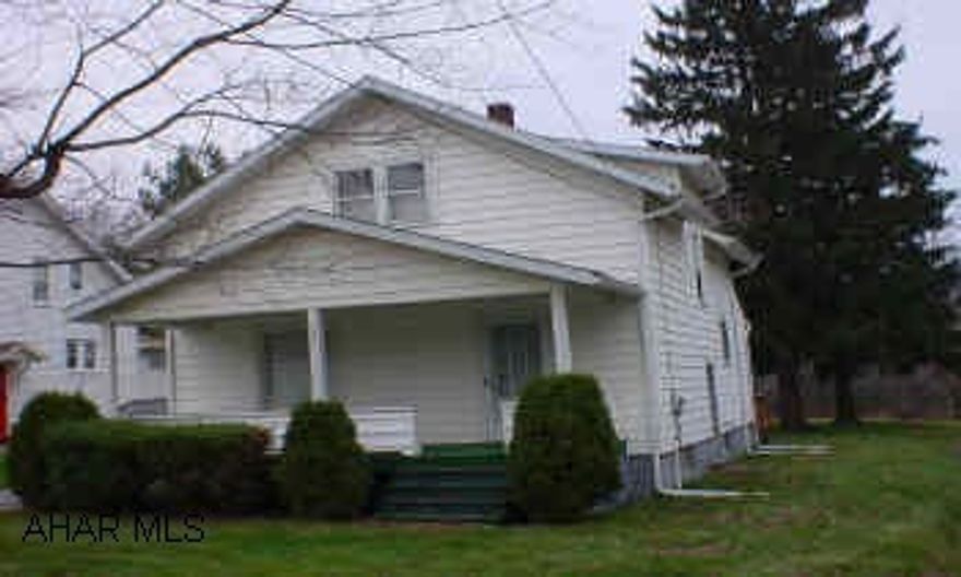 2 STORY, 3 BEDROOM, VINYL SIDED.  NEW ROOF, UPDATED KITCHEN, LARGE 2-CAR GARAGE WITH OVERHEAD STORAGE, COULD BE MADE INTO APARTMENT. BEAUTIFUL REAR DECK, COVERED PORCH AND UPDATED WIRING