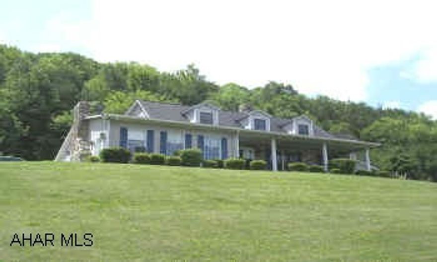 TWO-STORY W/ATTACHED 2-CAR GARAGE AND BARN ON 5.8 ACRES. INCREDIBLE VIEW FROM THIS LOVELY 4,078 SQ. FT. 2-STORY ON 5.8 ACRES.  GORGEOUS WOODMODE KITCHEN W/JENN-AIRE GRILL.  FIREPLACES IN KITCHEN AND LR HAVE WB INSERTS. IN-GROUND POOL.  BARN WITH 3 HORSE STALLS. ROOM FOR RIDING RING.  DRIVEWAY IN ON R.O.W.