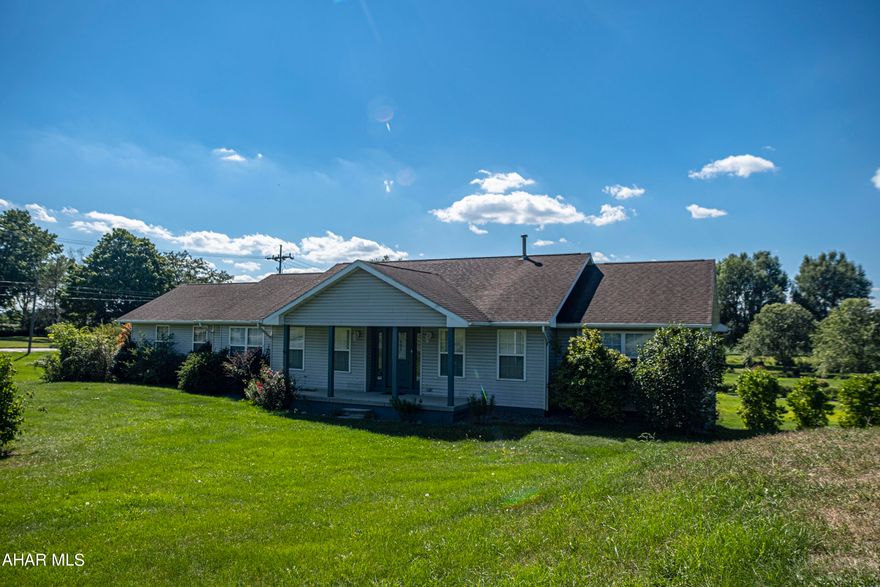 So Much to offer!  Rural Martinsburg one-level living on over 1-1/3 acres! ...Country living, but just a few minutes from services, shopping & restaurants in town.  Cooking enthusiasts will love the kitchen with all new Bosch appliances and an island + table space. Large family room off the foyer is great for entertaining or relaxing by the natural gas free-standing fireplace. Large MBR has jacuzzi-style tub and step-in separate shower. Step-up 4th bedroom can be office or apartment, with kitchen and bath.  Expansive deck off family room (new Pella sliding glass door) with steps down to the driveway and back yard.  Short walk or drive to Ritchey's Dairy Store/Ice Cream Shop.  Also, only a couple of miles drive to the Blair County Airport.  The unfinished basement has 4 rooms, and access to the oversized 2-car garage.