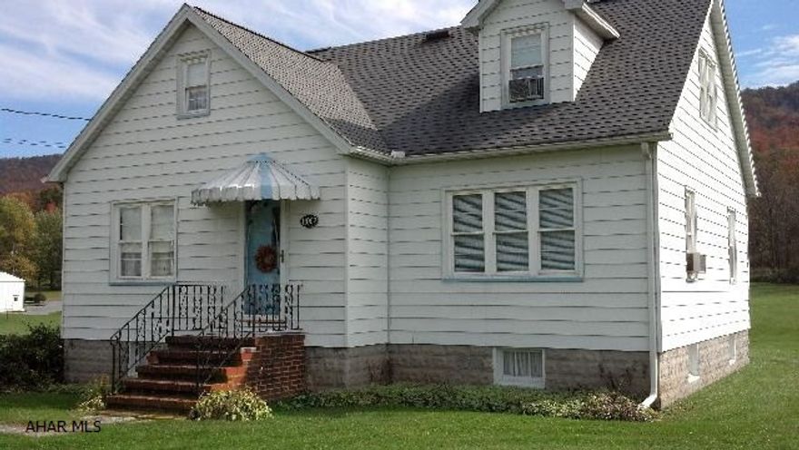 Simply adorable!  Spacious 3 bedroom, 1.5 bath - 1st floor bedroom - upstairs bedrooms are spacious with walk-in closets.  Gorgeous view - 3.25 acres (2 parcels), updated windows, hardwood floors.  Better hurry!