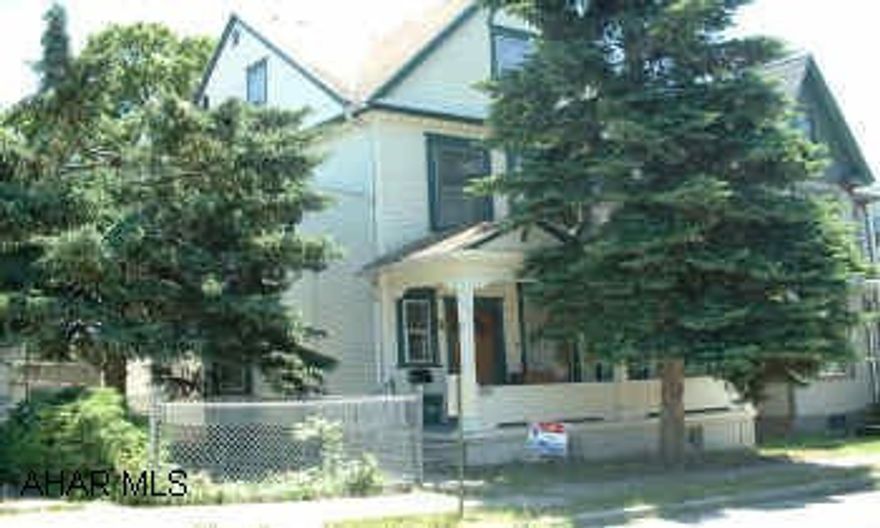 Large home fenced yard, oversized garage Large home with finished attic 1st floor laundry and 1/2 bath