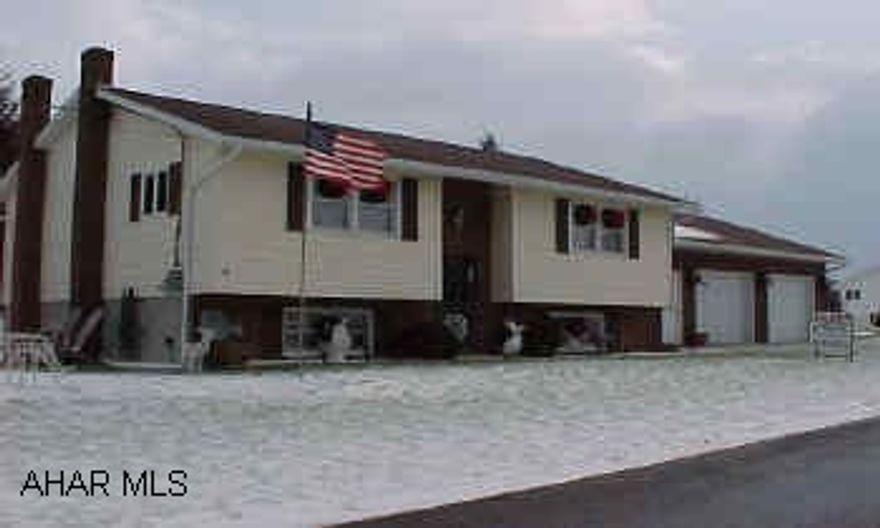 Excellent condition! New finished family room w/woodburner and playroom. Large 2 car garage. Water softener w/chlorinator.