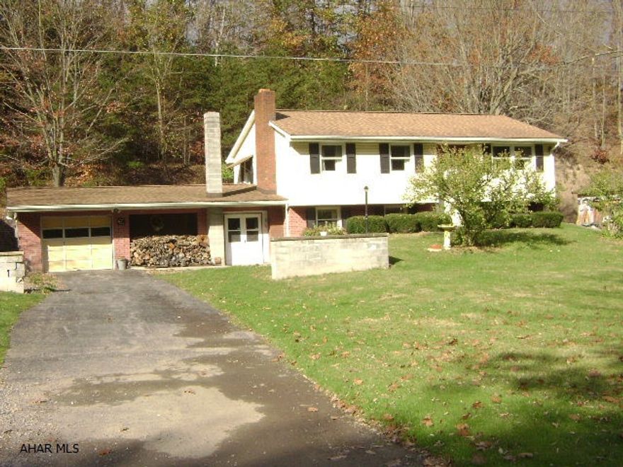 Great 3 bedroom 2 bath split entry home on almost 1 acre in Hollidaysburg. 2 car attached garage and a large detached 4 car garage
