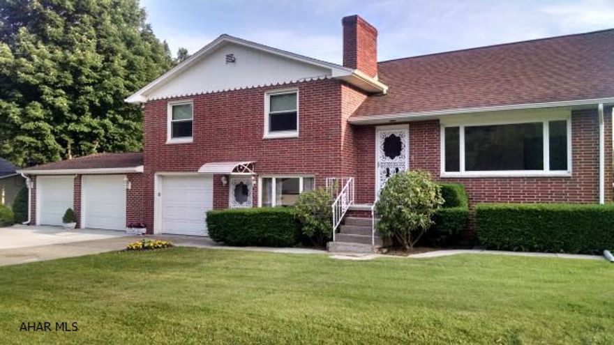 Beautiful neighborhood above Penn State Campus, large well maintained, well built brick 4 level split, 4 bedroom, 2 bath, hardwood floors, 3 car garage. Wow so much space, whether using entire home yourself or using the low suite for family, this awesome home is sure to please! Better hurry, will not last! Seller updated panel box to 200 amp breakers as of October 2015.