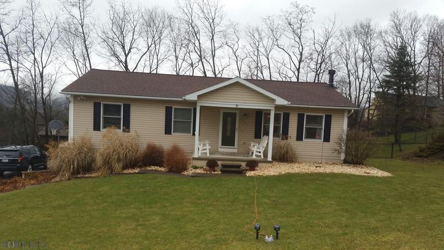 Stunning Raised Ranch with many updates!! Updated open kitchen with soapstone countertops!; Just Pack your bags and move in!    Open concept in living/kitchen/dining area.  New LVT flooring throughout kitchen/living/dining, Newly fenced in lot on 0.4 acres plus an oversized 2 car garage!   Beautiful deck overlooking Hollidaysburg.  Must see!  Will not last long at this price!    Taxes are approximated by Seller.