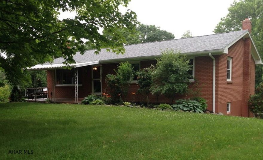 Brick ranch located on a quiet road surrounded by nature. The renovated kitchen opens onto a lovely back deck that looks over a private yard with the sounds of a babbling brook. Wild life is abundant in this area and the back yard will not disappoint. State game lands and fishing are a short distance away. The present owners have spared no expense in updating this home. New windows, roof, hardwood flooring, ceramic tiles, windows and so much more make this a must see property. The newly renovated kitchen comes complete with granite countertops, stainless steel appliances, new cabinets and flooring. A fabulous in-law suite is found in the lower level and includes kitchen, bath, living room and bedroom with walk out to a great yard.