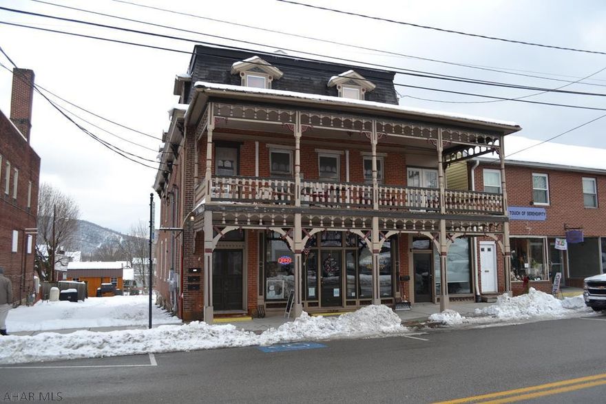 Investment opportunity in Historic Downtown Bedford PA.   Mixed use commercial building with first floor restaurant and second and third floor residential apartments.   Off street parking for 8 with additional outdoor space for expansion.