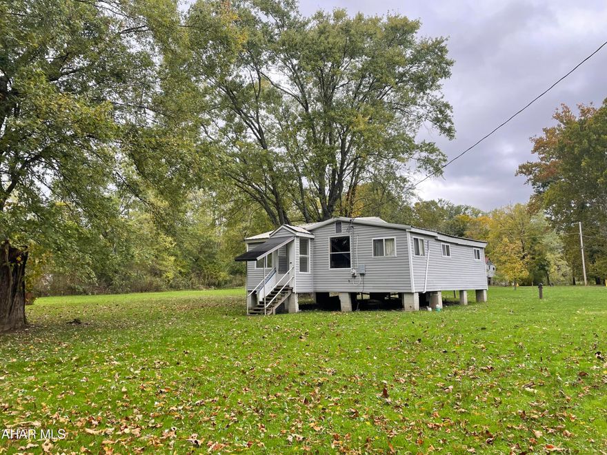 This multi lot listing provides endless possibilities. This could be an opportunity if you are looking for a relaxing escape to a private oasis. Imagine a weekend of fishing in the early spring, summer cookouts and picnics taking you into warm bonfires into the fall. There is so much charm, and opportunity on this unique piece of property that you won't want to miss it if you're looking for that perfect little hideaway. Includes the current structure that could be finished or replaced. Public water and sewer are on this lot.