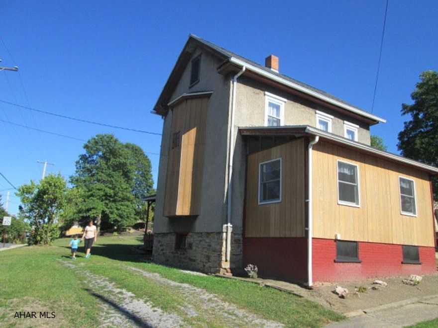 Historic house in the Borough of Hollidaysburg. This old family home sits on a 50X150 corner lot. The interior of this home will need a total redo. The home features the large corner lot, newer roof, and large rooms. This home is being offered As Is Where Is.