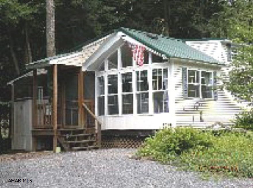 Great get away. 3 bedrooms,1 bath, fully furnished, large deck partially screened w/ fan, central air, 2 lots, 2 sheds