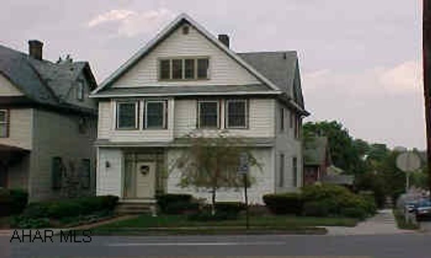 Attractive family home on landscaped corner lot, rear deck,family room, good in-town location. Finished 3rd floor.