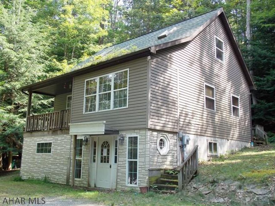 Glendale Yearound 1 1/2 story in need of TLC. Eat-in oak kitchen with center island and large adjoining great room. Finished basement with family room, rear deck, vaulted ceilings, skylights, 2nd floor balcony and more. AS-IS sale. Seller will make no repairs. HOA fees apply.