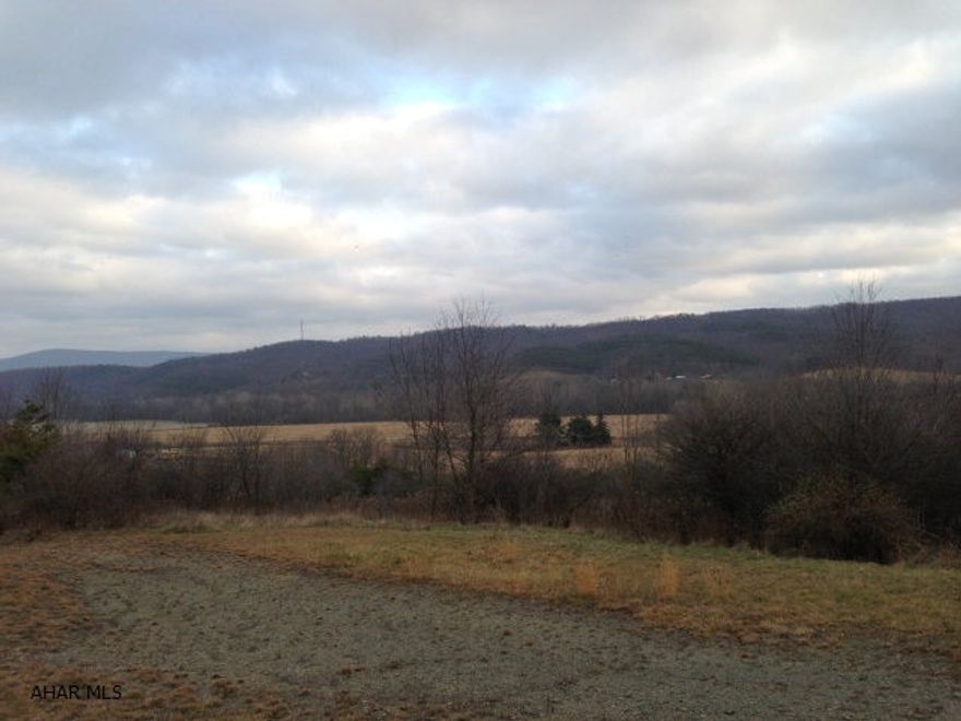 Great location and very private but just a few minutes to Shawnee State Park. This property would make a great hunting retreat, home or just a weekend cabin.  Property has electric.  Beautiful view makes this exceptional and a great property to do many things with and has a small stream.