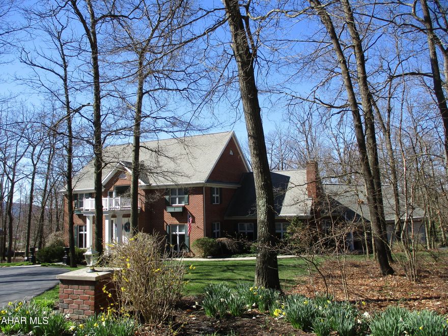 Architecturally designed and meticulously maintained, this beautifully landscaped Two story all brick home is nestled on a 1.55 acre wooded lot in The Glades. From the moment you step inside the spacious marble foyer to the open concept kitchen, family room and nook area you feel the warmth and charm of this one-of-a-kind home. The first floor offers ten-foot ceilings and Oak floors. First floor laundry with built ins.  Master suite with FP, built-ins, 2 walk-in closets, and a spacious bath with a jacuzzi tub & shower. All custom Cherry Study including Cherry floor & custom coffered ceiling with an electric marble FP. Built in wine storage area for the wine lovers. The second floor offers four additional bedrooms with ample closet space and three additional bathrooms & a sitting area. Finished walk out lower level with a family room, bar area, workout room, full bath & an abundance of storage space. Central Vac. Three car garage with side entrance and a beautiful stamped concrete patio & walkways. This home has too many amenities to list!