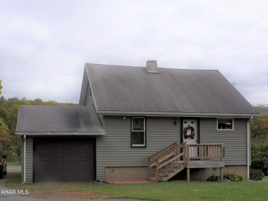 Charming bungalow in Bellwood Antis School District.  First floor bedroom and bath.  Second floor has 2 small bedrooms.  Super 1/2 acre corner lot!  Off-street parking and attached garage.  Seller must find suitable housing.  Beautiful wood deck with handicap access.
