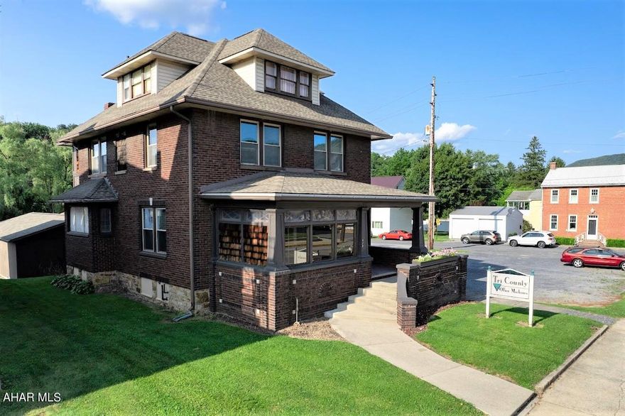 Location, location, location!!! Quality 2 1/2-story brick building in downtown Bedford. Excellent visibility and exposure on this very well maintained and cared for property. Large and private 25+ vehicle parking lot which is very rare to find. Building was previously used as professional office space but can accommodate many business types. Private offices, open areas, 2.5 baths, storage rooms and a two bedroom apartment. Oil HW heat, central air-conditioning on the first and second levels, and 200-ampere electric. Full basement with a concrete floor and exterior walk-out. Many updates including main level lighting, paint and carpet. Large garage/storage building located on the rear of the lot. This is a beautiful building in the heart of Bedford!!