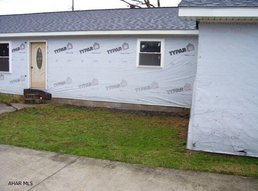 1,248sf rancher in Saxton Borough. Never Finished. Needs exterior siding completed and entire interior needs completed. Built on a crawl space. One car garage. 50x150 lot. Utilities also need completed. Heating and plumbing need completed. Soffit, fascia and gutters need completed. Driveway needs completed.