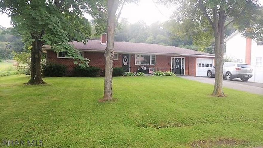 Located on the outskirts of town you will find this low maintenance and well kept home waiting for you. This home offers large open rooms, giving you plenty of space to enjoy time with family and friends. The large back yard also makes a nice place to entertain guests and is fenced in. This home is NOT in the flood plan.