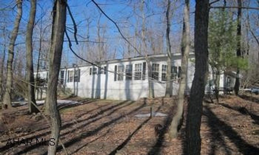 A Little Bit Of Heaven - Very Secluded - 1991 Commodore, 28x66 - With Full Foundation - 5 Skylights (Anderson) - Full / Partial Basement W / Concrete Floor On 5 Acres - U.V. Light In Well - Dish TV - Deed Restrictions. A Little Bit Of Heaven - Very Secluded - 1991 Commodore, 28x66 - With Full Foundation - 5 Skylights (Anderson) - Full / Partial Basement W / Concrete Floor On 5 Acres - U.V. Light In Well - Dish TV - Deed Restrictions.  Owner Looking For Offers.