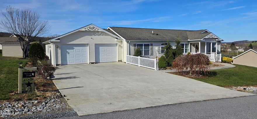 What a find!  Immaculate, one story home with incredible views.  Open floor plan.  Master suite with soaking tub and walk in closet.  Convenient, main floor laundry.  Heat pump with central air. This home is ready for you to move in and enjoy!