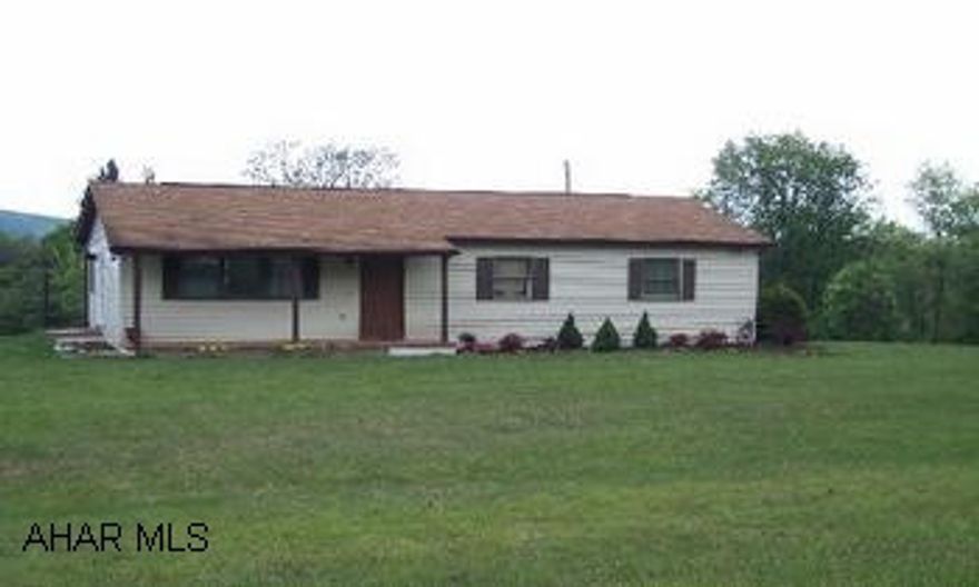 Completely renovated!  Large circular drive, apple and peach trees, house is nicely landscaped, large yard, most of the property is wooded.  New carpet, new appliances, oversized 1 car garage has a large workshop and hookup for woodburner.  All the privacy you could want!