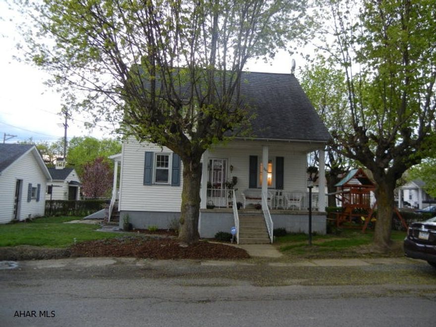 New windows, hardwood flooring, security system, 2 car garage.