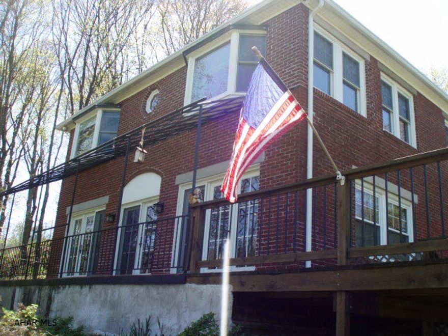 Private setting with a Million Dollar View that over-looks the Bedford Elks. Abundance of lighting in all the front rooms. Beautiful custom kitchen w/heated floor. A fabulous master bedroom & bath. Hardwood floors. Side deck off the front porch. Beautiful brick driveway. HSA Home Warranty included. New Radon system put in 5/4/12.