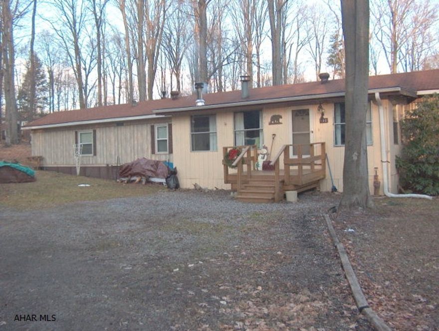 Super nice single wide mobile home with addition, large family room with wood burner & newer flooring. Must sell! Looking for offers!