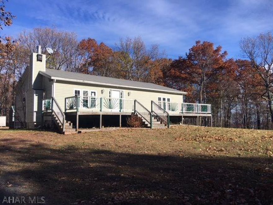 4 bedroom, 3 bath home on level 0.62 acre lot. Spiral staircase. Open floor plan with kitchen island plumbed for second sink and electric for cooktop, large 1st floor master with walk in closet and master bath featuring Jacuzzi tub. No utilities are on. Buyer will need to make application for new septic system due to drain field being on neighboring property. Survey shows property line going through garage with small portion of garage being on this property. Survey markers are clear. Wood burner, forced air oil, central air. Property being sold AS-IS in current condition. Condition of mechanics are unknown.