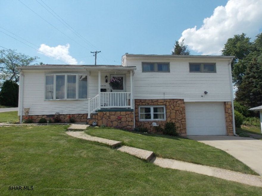 Adorable 4BR/2BA home on a corner lot in Pleasant Valley is sure to please everyone in the family. The hardwood floors add so much character and warmth to the home.  Plenty of space for the growing family and room for guests as well. The main floor bedroom could be the master or a perfect spot for Mom when she comes to visit. Upstairs there are an additional 3 bedrooms and a full bath.  The mud room is a great place for coats, boots and shoes as you walk in from the garage. Dad will love the huge workshop in the basement with plenty of storage. Outside sit on the patio or in the yard and enjoy the mountain views.  All of this conveniently located to I-99, shopping and restaurants.