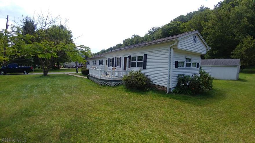 3 bedroom manufactured home situated on a nice 1.3 acre lot outside of Tyrone.  Central air for the summer and a nice enclosed porch to enjoy 3 seasons.  1 car detached garage with a paved driveway and multiple out buildings.