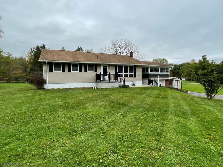 One story - 3 bedroom home on quiet Harris Street. This home sits on a flat 0.8 acre lot. Hardwood flooring and full unfinished basement with lots of potential.