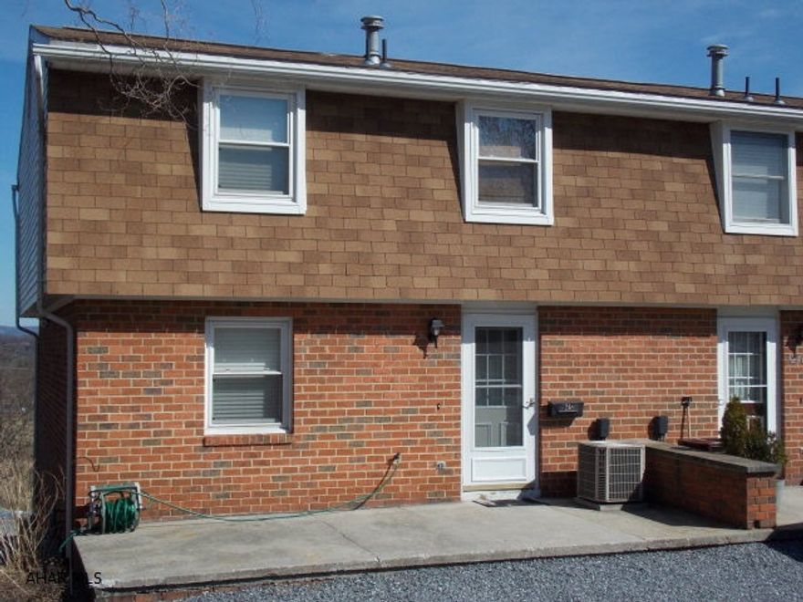 Roomy end unit town home in Maple Hollow. Three nice sized bedrooms and 1.5 baths. When walking in you will notice it is freshly painted and very nice flooring. The living room is large, great for enteraining and leads out to the deck which has great view of the mountians. The kitchen is bright and updated, all kitchen appliances stay with the home. There is also a full size dining room and a large coat closet in the foyer. Upstairs are 3 bedrooms and the bath. Nice sized closets in each bedroom and in the hall. The laundry and half bath are in the basement as well as an over sized 1 car garage with extra storage. There is parking in both the front and back of the home so much room for your guests. The yard is bigger than most so the kids have room to play.