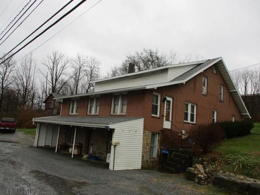 Former Thomas Fruit Market. Frontage on Route 764. Several possibilities as retail or storage/repair and rent the living space. 3 bedroom 1 bath on 1st level- 2nd level unfinished- full basement with 8' ceilings. Older two story barn for additional storage. One acre  200 x 220