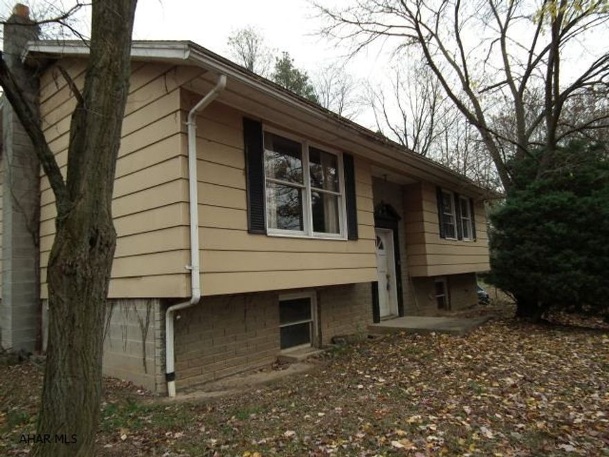 Priced to sell-Property lot is .85 acre, split level home has 3 bedrooms 1 Bath-partially finished basement-basement wall will need work