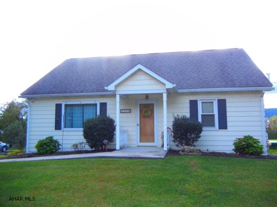 Move to the country but still live close enough to conveniences!  Say Goodbye to fast lane living and relax on the Sun porch that is conveniently located just off the kitchen.  Sip your coffee in the morning or relax in the evening after a hard day at work.  This home has FOUR bedrooms -- 2 on main level and 2 on 2nd floor (1 on 2nd floor is BRAND new addition)  Has a spacious eat in kitchen as well to host family holiday dinners.  1 car garage and this home is situated on almost 3/4 of an acre.  Call agent today to schedule your private showing.