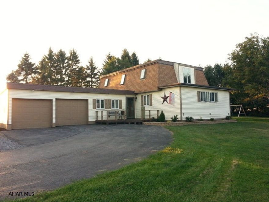 This one of a kind home sits on 1.5 beautifully landscaped acres with million dollar views. The cozy inside is so nicely updated and maintained, you may not want to ever leave. To see is to appreciate, the uniqueness of this home is unmatched -- call today for your tour before it's to late!!