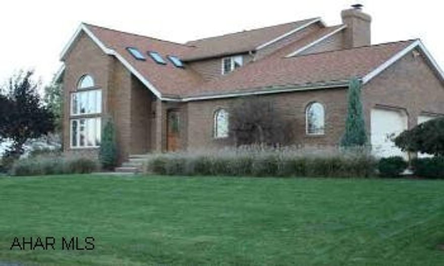 Stunning 2 story brick & vinyl 3 BR, 2  bath home on 150 x 195 landscaped lot! Gas hot water radiant/baseboard  heat,  central air, central vac, cathedral ceiling with skylights. Large rear deck. 2 car attached garage.  Many extras! Call Scott Stunning 2 story brick & vinyl 3 BR, 2  bath home on 150 x 195 landscaped lot! Gas hot water radiant/baseboard  heat,  central air, central vac, cathedral ceiling with skylights. Large rear deck. 2 car attached garage.  Many extras! Call Scott at 472-4761