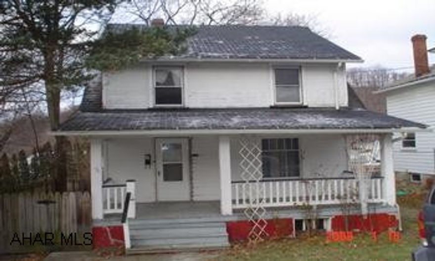 2 story 3BR 1BA Newer roof and windows, needs some paint and carpet. Fenced-in yard shared driveway. 1 car garage.