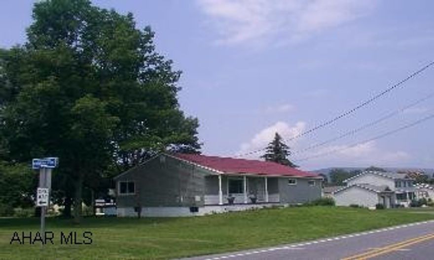 Fabulous Frankstown ranch totally redone.  Hardwood floors, new carpet, plumbing, wiring, new kitchen and baths.  New siding and windows with warranty on large landscaped corner lot with mature trees.  Just Move In!   Home adjoins Old Towne Village.